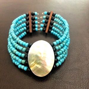 NWOT -Bracelet with motherof Pearl face